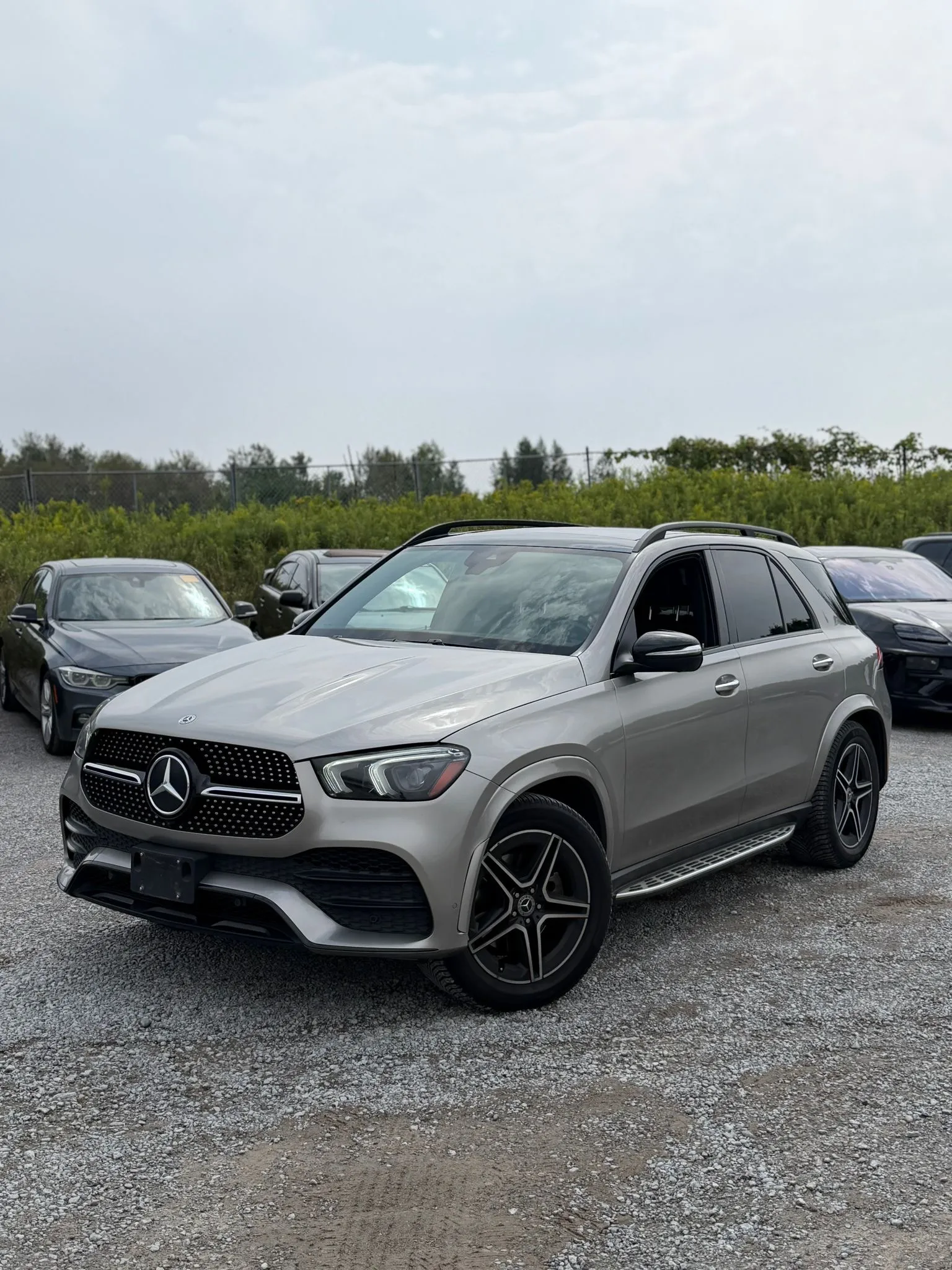 A silver Mercedes-Benz GLE SUV