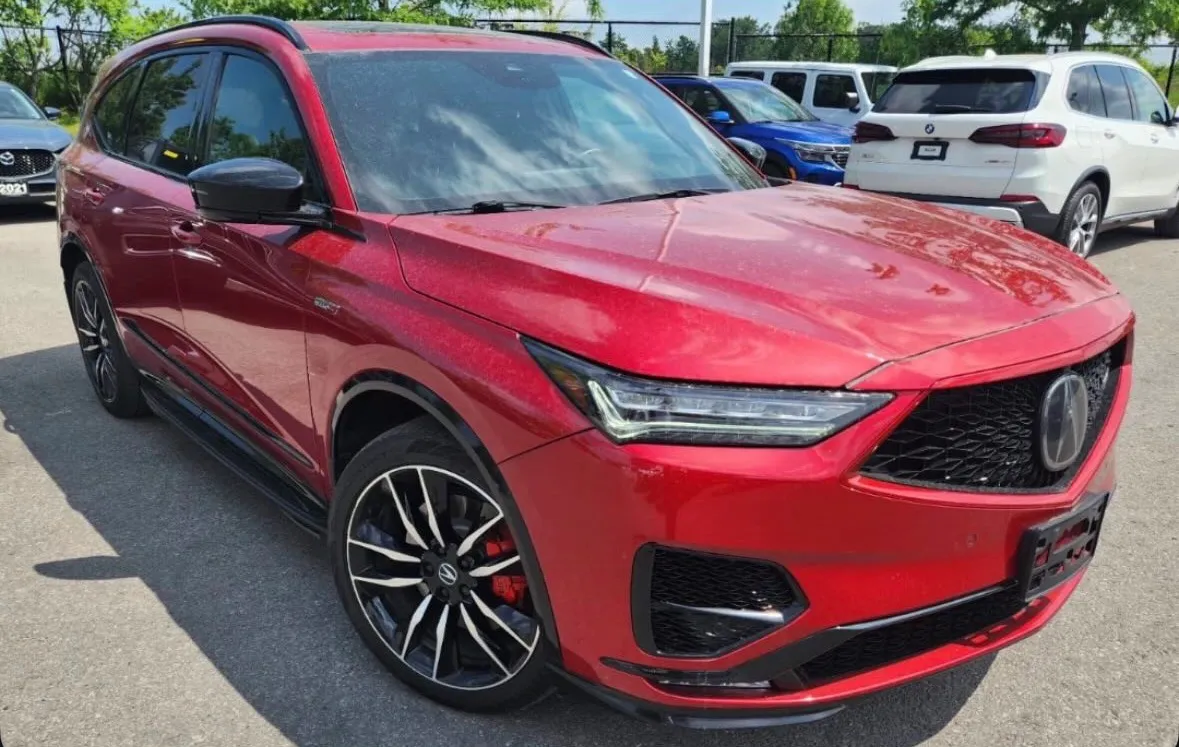 A red Acura SUV
