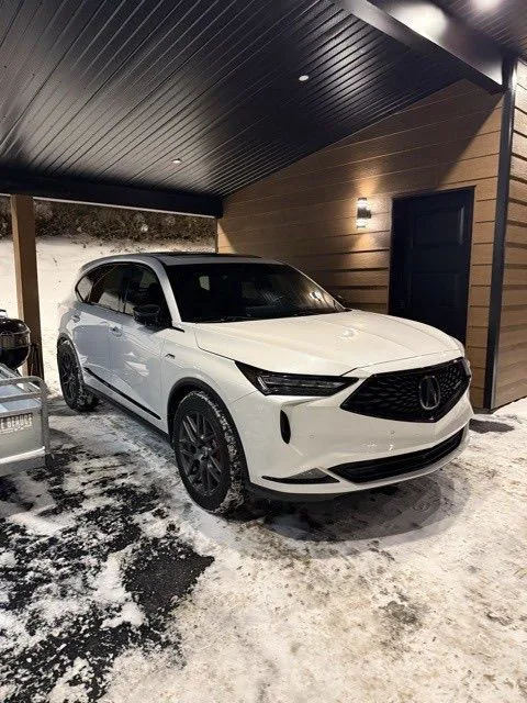 A white Acura MDX